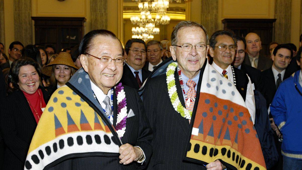 Senators Ted Stevens and Daniel Inouye standing together at an event