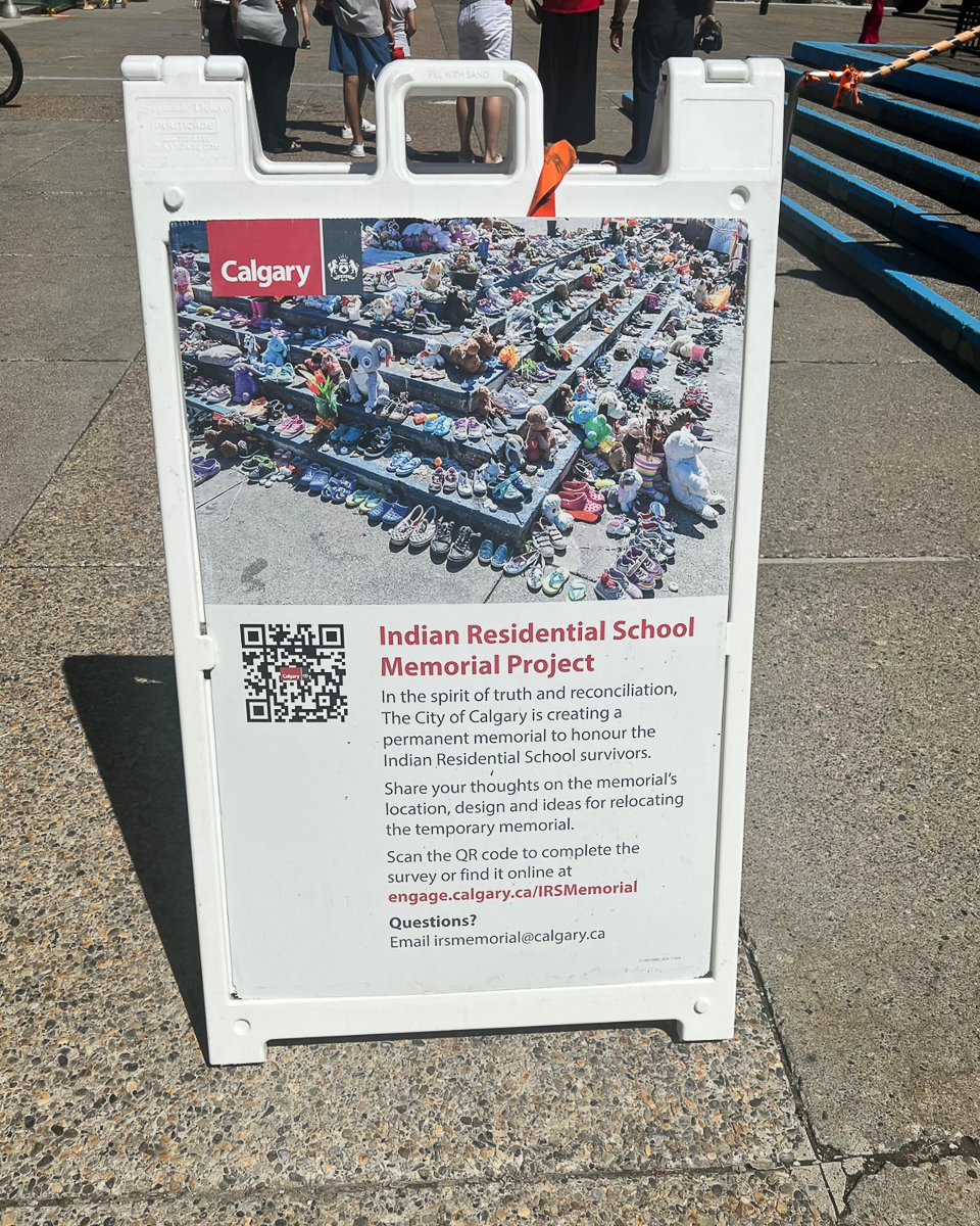 oudoor sign explaining history of Indian Residential School Memorial Project