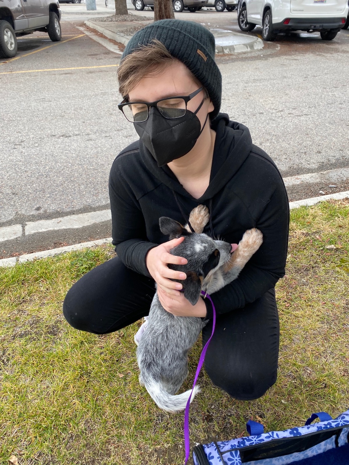 Briana Moffat greets her new puppy