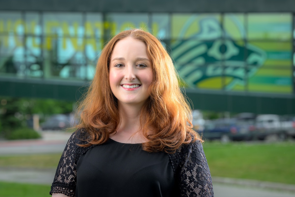 Martina Weddel with scenic UAA campus background