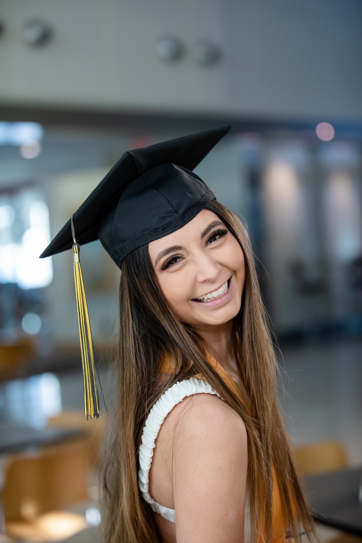 Dakota Ramirez wearing her graduation cap