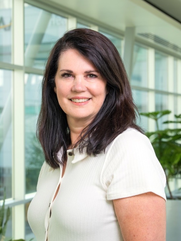 Carrie Shamburger smiling at the UAA campus