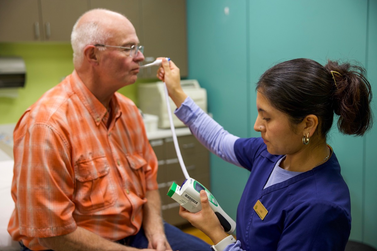 UAA medical assisting student takes vitals during simulation training