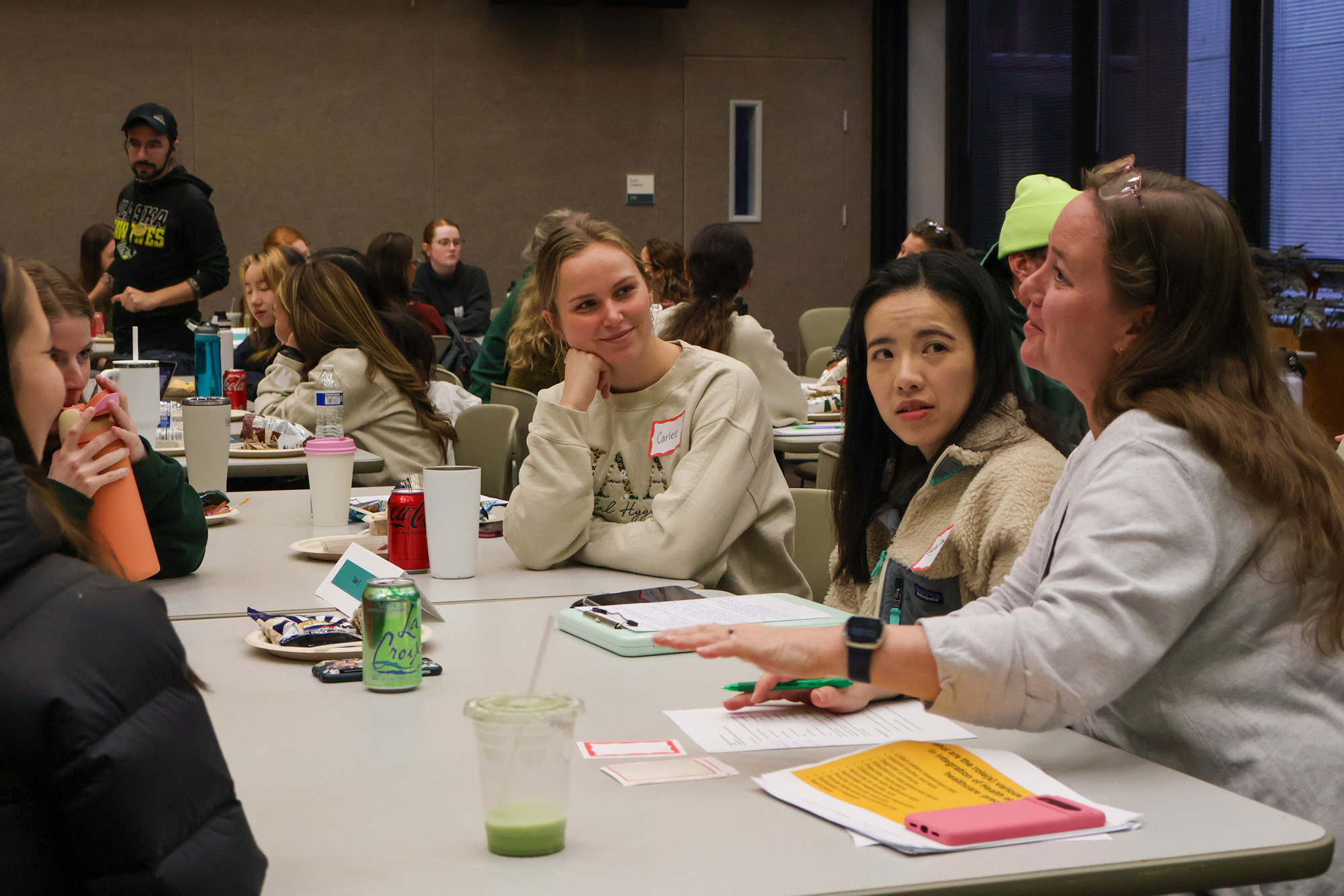 Facilitator Amy Urbanus, MS, RDN, LD, CSG, engages a small group during a breakout session at the 2024 Fall Grand Rounds on Health at Every Size™ on Nov. 8, 2024, at the University of Alaska Anchorage. (Photo by Kevin Bennett, UAA Alaska Center for Rural Health & Health Workforce)