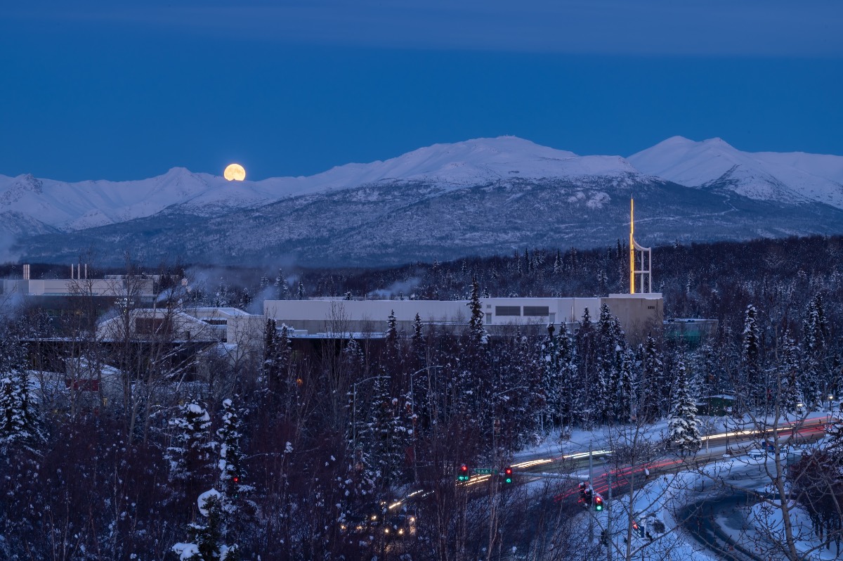 Moon over the UAA Library in winter. 