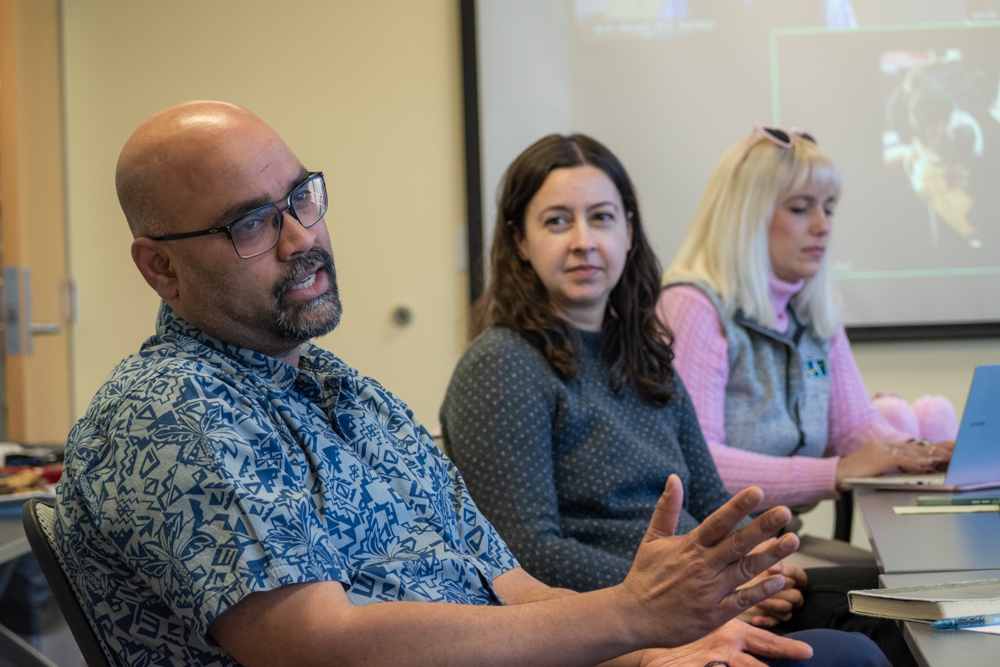 faculty in discussion