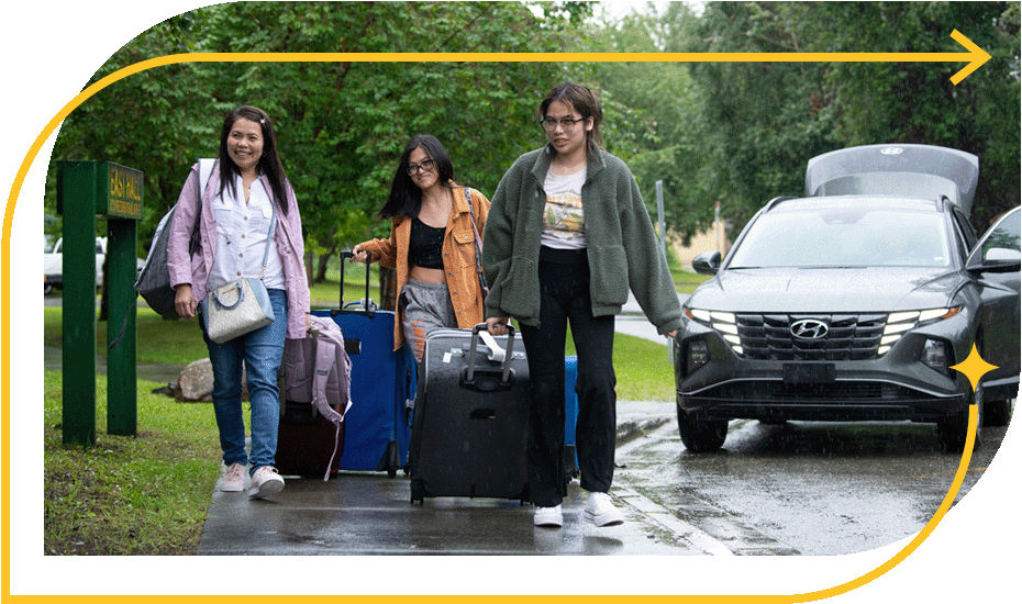 Family helping student moving in to the Residence Halls.