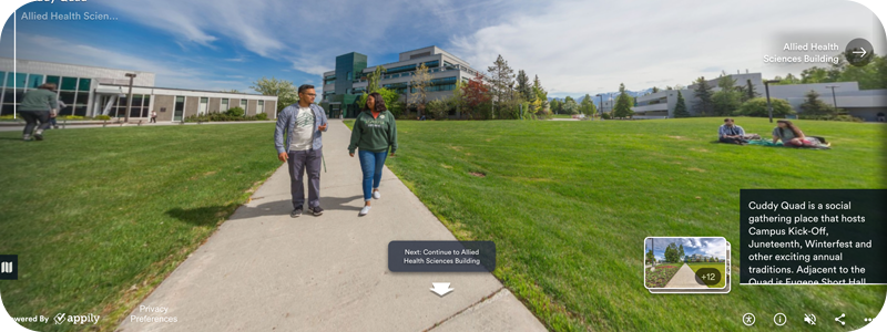 Screen shot of virtual tour, showing people in the Cuddy Quad during the summer.