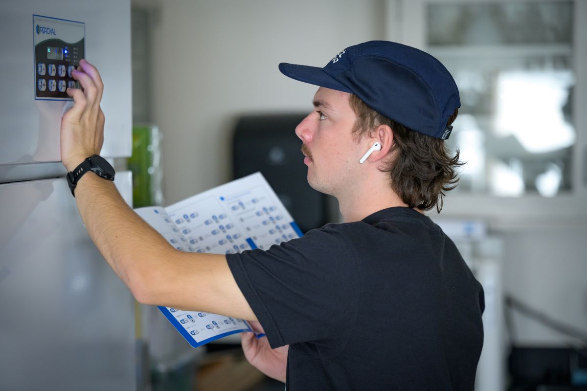 Sean Mueller setting up a kelp incubator